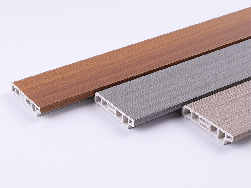 V&aacute;n ch&acirc;n tường PVC hạt gỗ 60 * 15mm